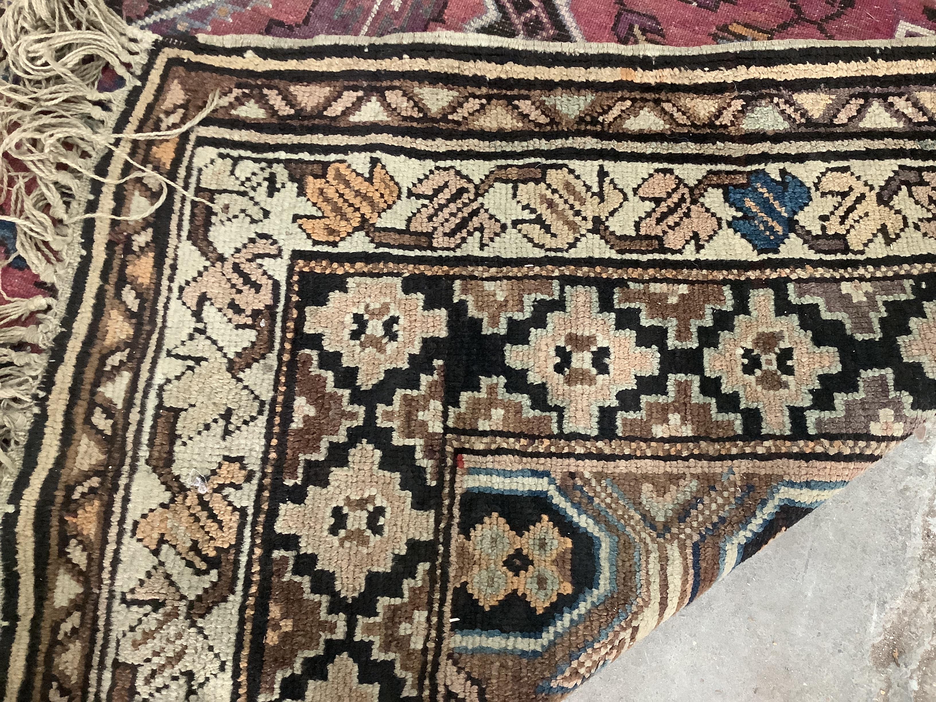 A Caucasian carpet, 330 x 180cm